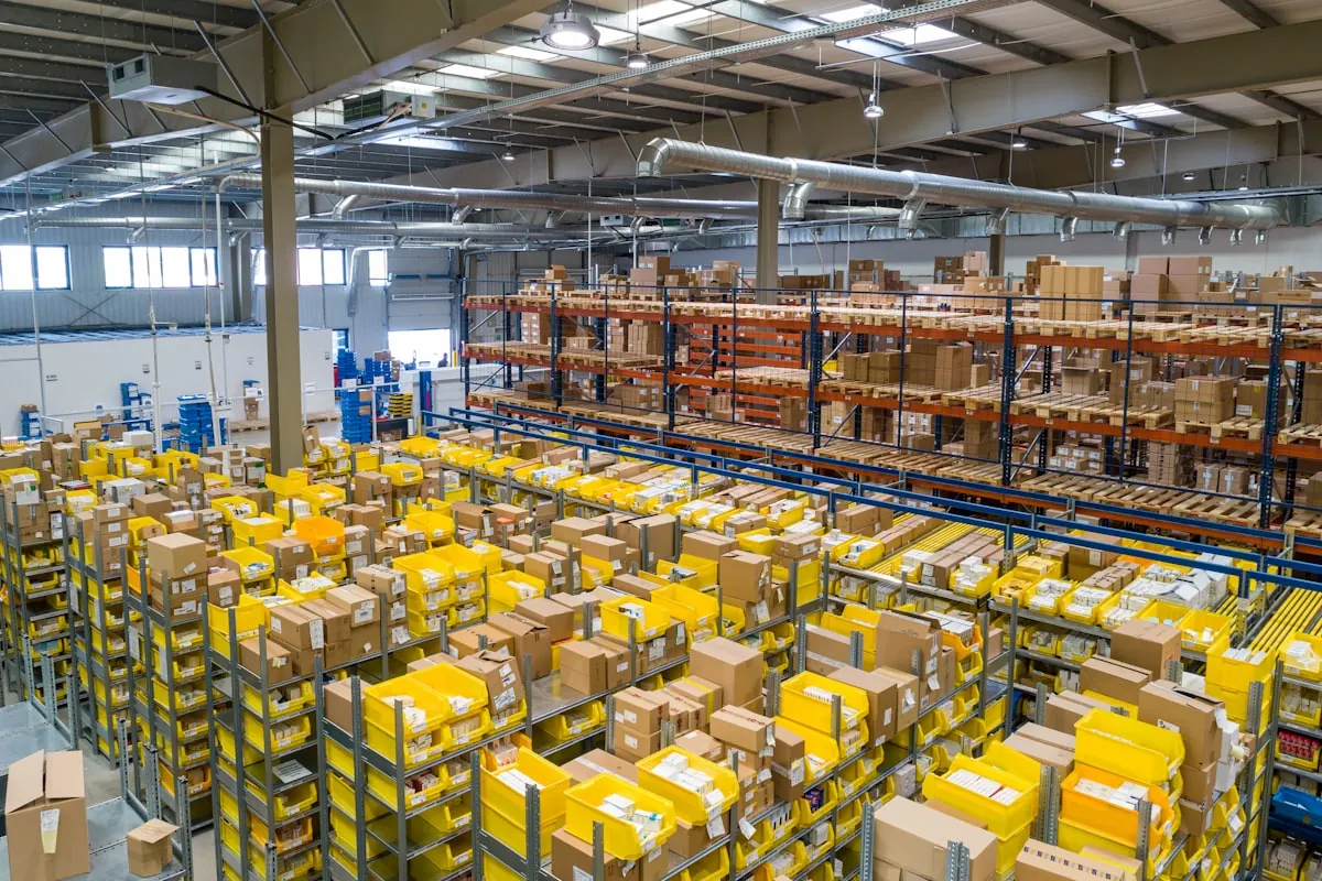 Pick and pack stations across a fulfillment center floor